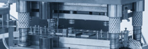 Closeup of equipment used for precision contract metal stamping.