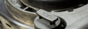 closeup of precision stamped metal parts used in lawn and garden equipment